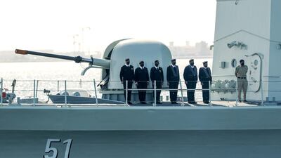 The vessels sailed through the Mussaffah channel with Abu Dhabi in the background.