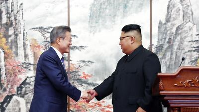 South Korean President Moon Jae-in shakes hands with North Korean leader Kim Jong Un during a joint press conference at Paekhwawon State Guesthouse. Getty Images