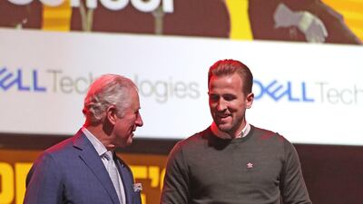 Prince Charles, Prince of Wales speaks to footballer Harry Kane on stage at The Prince's Trust Awards held at the London Palladium on March 11, 2020. Getty Images