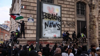 A protester waves a Palestinian flag, in Paris AFP