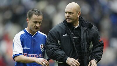 Ray Wilkins speaks to Millwall manager Dennis Wise during the FA Cup Semi Final match between Sunderland and Millwall at Old Trafford on April 4, 2004 in Manchester, England. Gary M.Prior / Getty Images