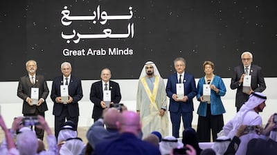 Sheikh Mohammed bin Rashid, Vice President and Ruler of Dubai, with the six winners of the Great Arab Minds Award 2025. Antonie Robertson / The National