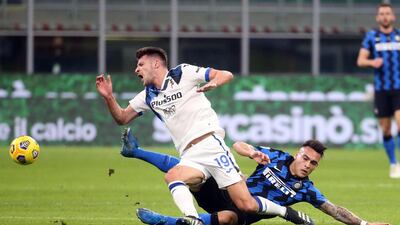 Atalanta's Berat Djimsiti in action against Inter's Lautaro Martinez. EPA