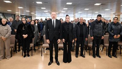 Azerbaijan's President Ilham Aliyev and his wife Mehriban Aliyeva attend a funeral ceremony for Capt Igor Kshnyakin, co-pilot Alexander Kalyaninov, flight attendant Hokuma Aliyeva and other crew members of the crashed Azerbaijan Airlines Flight J2-8243, at Heydar Aliyev International Airport near Baku on December 29, 2024. Reuters