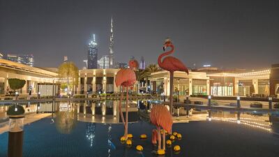The Burj Khalifa stands tall in the backdrop at Dubai's City Walk shopping area