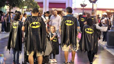 People showing off their capes at Warner Bros in Abu Dhabi. Pawan Singh / The National