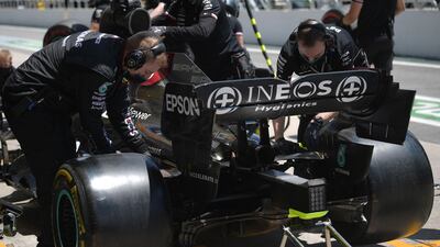 Seven-time champion Lewis Hamilton was penalised after his Mercedes' DRS system was judged to have exceeded allowed limits. AFP