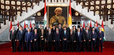 Members of the new cabinet of the Kurdistan parliament headed by Prime Minister Masrour Barzani pose for a family photo, in Erbil, Iraq. Reuters