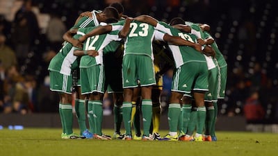 Nigeria huddle before their friendly with Italy on Monday night. Claudio Villa / Getty Images