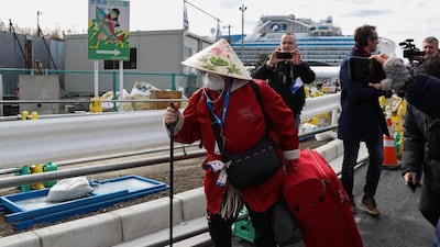 A passenger of Diamond Princess cruise ship leaves Daikoku Pier in Yokohama. Getty Images