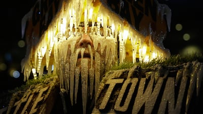 Green Bay Packers fan Jeff Kahlow, known as Frozen Tundra Man, wears one of his headgear creations for his team's NFL match against Philadelphia Eagles, in Green Bay, Wisconsin. AP