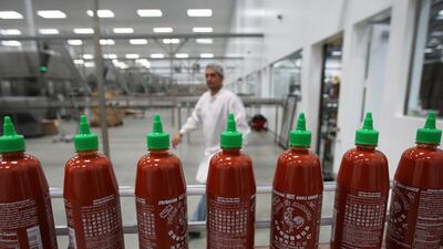 Bottles are produced for Sriracha Hot Chili Sauce at the Huy Fong Foods plant. David McNew / Getty Images / AFP