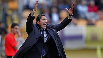 Villarreal’s ambitious coach, Juan Carlos Garrido, makes his feelings known from the touchline during a Primera Liga game at El Madrigal stadium.