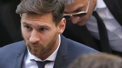 Barcelona player Lionel Messi arrives at a court in Barcelona Messi’s tax trial began Tuesday. Messi and his father, Jorge Horacio, have been charged with three counts of tax fraud. Manu Fernandez / AP Photo