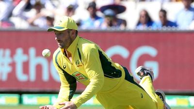 Australia’s Shaun Marsh tries to catch out India’s Virat Kohli in Melbourne. Hamish Blair / Reuters