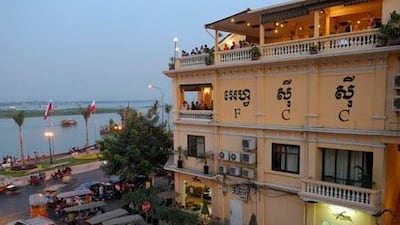 One of Phnom Penh’s culinary options, the FCC Restaurant, offers fine dining in its renovated colonial-era building. Jerry Redfern/LightRocket / Getty Images)
