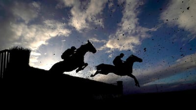 Runners and Riders clear a fence during the Newton King Estate Agents Handicap Chase at Taunton Racecourse on Wednesday, October 28. PA