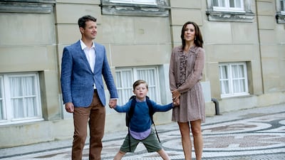 Prince Christian between his parents, Crown Prince Frederik and Crown Princess Mary on the way to his first day of school in Copenhagen, in 2011. EPA