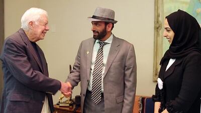 Jimmy Carter, former US president, with Essa Al Maidoor, chairman of Noor Dubai Foundation, and Dr Manal Taryam, chief executive of Noor Dubai Foundation. Courtesy Noor Dubai Foundation