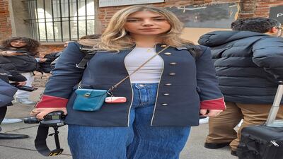 Teaming a navel jacket with jeans in Milan