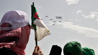 The Algerian air force flies in formation over the capital Algiers, as the country celebrates the 60th anniversary of its independence. AFP