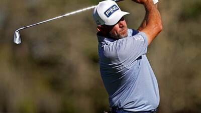 Lee Westwood, leader after the second round, plays his shot from the sixth tee. USA Today