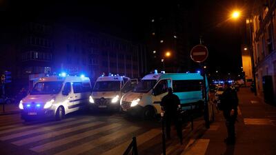 French policemen block a street in Clichy, north-west of Paris, on Tuesday. AFP