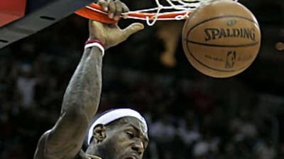 The Cleveland Cavaliers' LeBron James dunks the ball during their victory over the Utah Jazz.