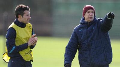 Robin van Persie and Arsene Wenger on the Arsenal training field together