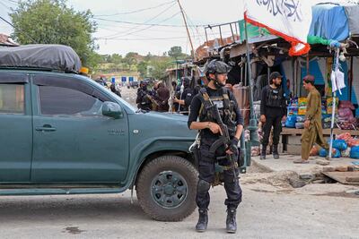Taliban security personnel stand guard in Khost, Afghanistan. The militants seized power in Kabul on August 15, 2021. AFP
