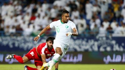 Saudi Arabia's Salem Al-Dawsari in action with Iraq's Mohammed Hameed. Reuters