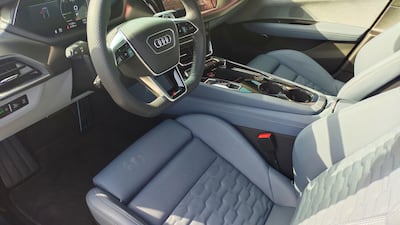 A pronounced centre tunnel separates the driver from other occupants in this low-slung model.