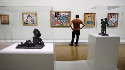 A visitor looks at works of art by Matisse, displayed as part of a retrospective exhibition held at the Centre Pompidou until February 22, 2021. EPA