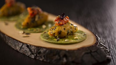 Sweet and sour pumpkin with spinach paratha and tomato salsa. Courtesy Tamba