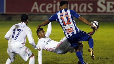 Real Madrid's Carlos Casemiro in action against Mourad El Ghezouani during their Copa del Rey defeat against Alcoyano on Wednesday, January 22. EPA