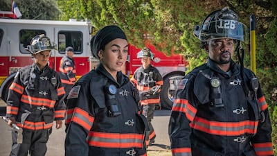 Natacha Karam, centre, plays a Muslim firefighter in '9-1-1 Lone Star'. Getty Images