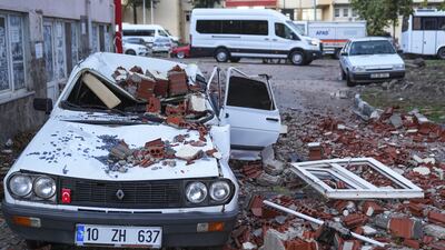 At least three unoccupied buildings and a two-storey shop collapsed in Sindirgi