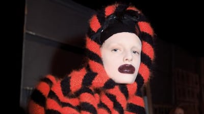 Models with clown mouths add to the surreal fantasy of Horn of Plenty. Courtesy Nick Waplington