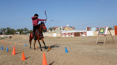 Staying calm and focused while standing up straight on a galloping horse is a challenge, says Mohammad Abu Musaed. Reuters