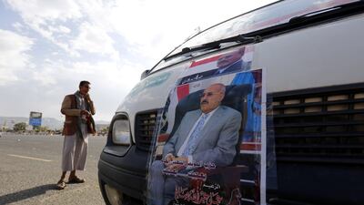 Posters of deposed president Ali Abdullah Saleh are seen on a bus ahead of 35th anniversary celebrations for the formation of his General People's Congress party, in Sanaa on August 20, 2017. Yahya Arhab / EPA