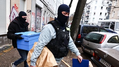 German police remove items during a raid on a property in Berlin over connections to the militant group Hamas and Samidoun, a pro-Palestinian organisation. EPA