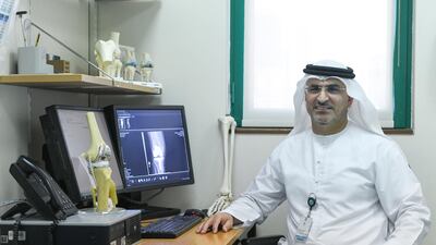Dr Yaaqoub Al Hammadi said robot assisted surgery improves quality of care for patients. Khushnum Bhandari for The National