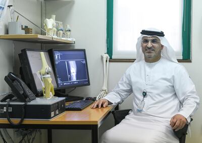 Dr Yaaqoub Al Hammadi, Consultant orthopaedic surgeon at Sheikh Khalifa Medical City, said robot assisted surgery improves quality of care for patients. Khushnum Bhandari for The National