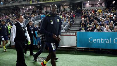 Usain Bolt walks on the sidelines before making an appearance for Central Coast Mariners during a pre-season friendly. AFP