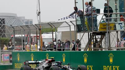 Mercedes' Valtteri Bottas takes the chequered flag to win the Turkish GP on Sunday. Reuters