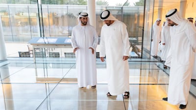 Sheikh Mohamed bin Zayed tours the Qasr Al Muwaiji exhibition. Seen with Mohamed Khalifa Al Mubarak.
