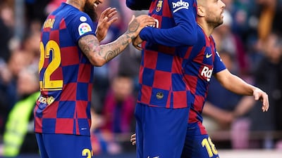 Arturo Vidal celebrates with Gerard Pique after scoring Barca's second goal. Getty