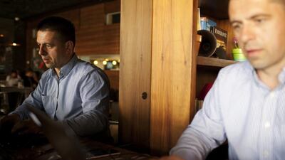 The ‘ethical hacker’ event held at a cafe in Dubai Media City is intended to educate participants about the risks users open themselves up to when using public Wi-Fi. Jason Hart demonstrates how people’s personal details can be accessed. Anna Nielsen for the National