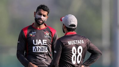 UAE captain Ahmed Raza, left, said he is looking forward to getting back into action against Ireland on Friday. Chris Whiteoak / The National