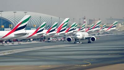 This weekend Emirates is expecting Dubai airport to be among its busiest since the pandemic began. Guiseppe Cacace / AFP